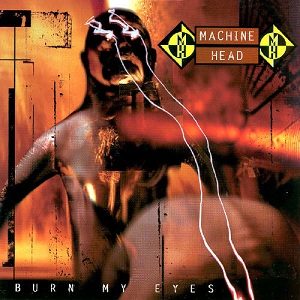 Burn My Eyes album cover: a shadowy figure crossed by a white lightning bolt on an orange and brown background, with the yellow Machine Head logo at top right