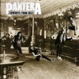 Cowboys From Hell album cover: the four members of Pantera pasted into a black and white photo of an old saloon with a roulette table, Phil Anselmo leaping in midair at right