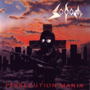 Album cover of Sodom’s Persecution Mania: a gas-masked soldier holding a rifle in front of a large cross and a ruined city skyline under a red sky